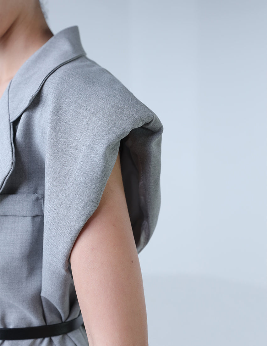Oversized vest with black belt