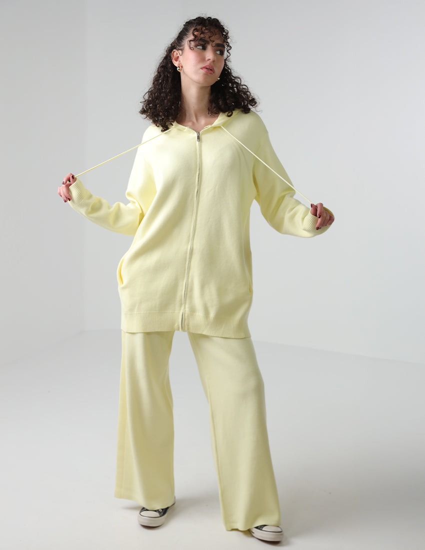 طقم قطني: هودي بسحاب كبير الحجم وبنطلون واسع الساق