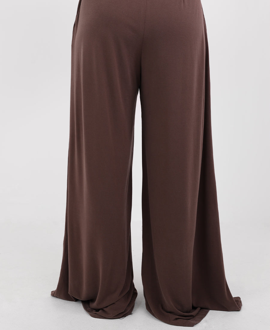 Wide leg trousers with an elasticated pleated waist