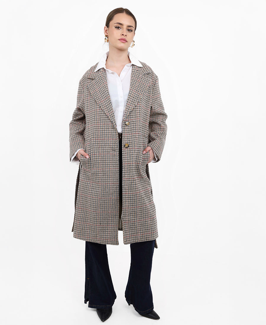 Long striped jacket with a belt at the waist