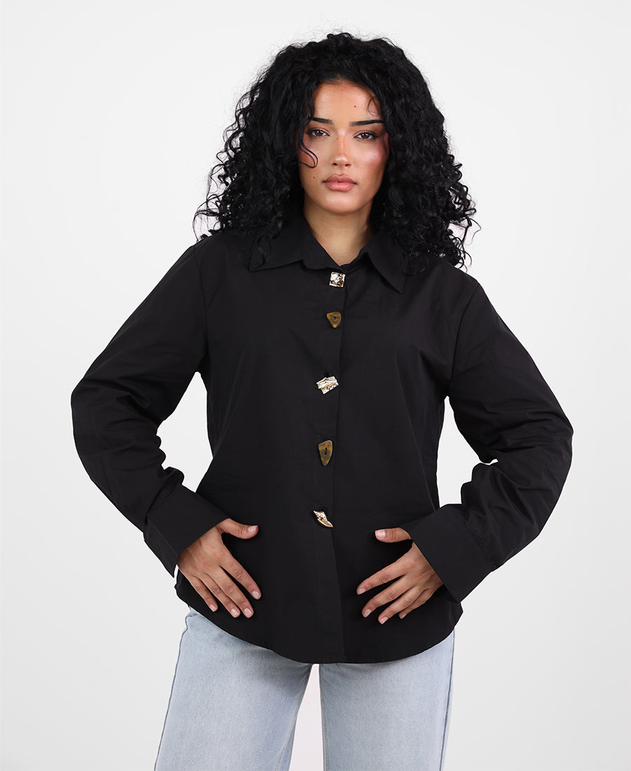 Shirt with assorted buttons and gold trim