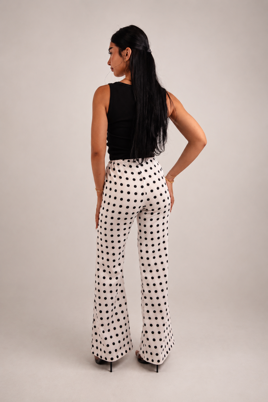 Black and white polka dot satin trousers
