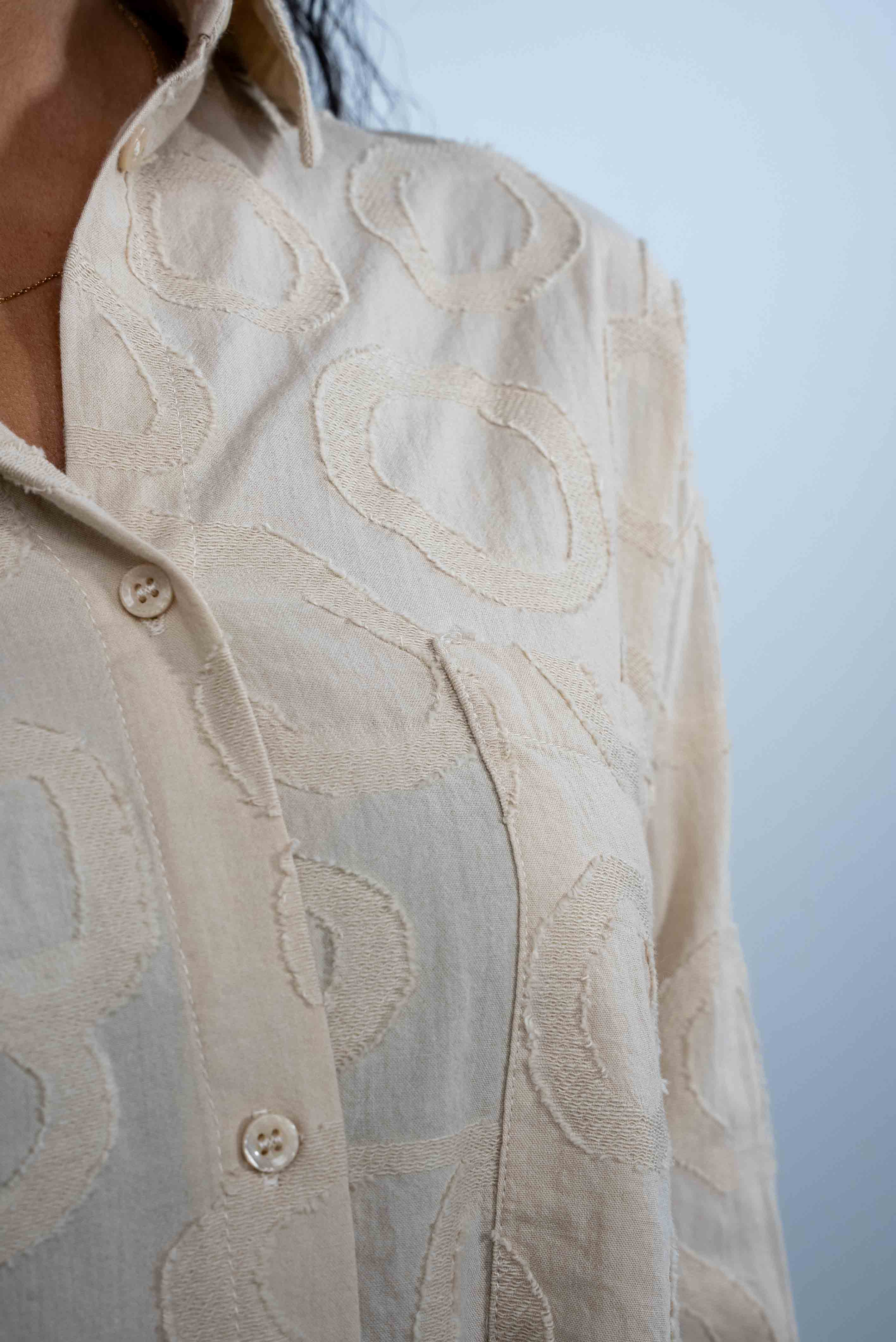 Oversized white shirt with raised rose embroidery