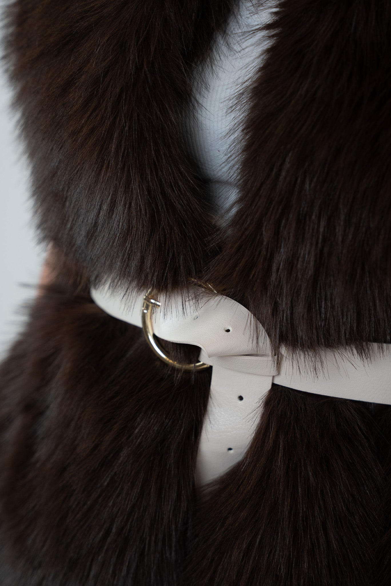 Fur vest with belt