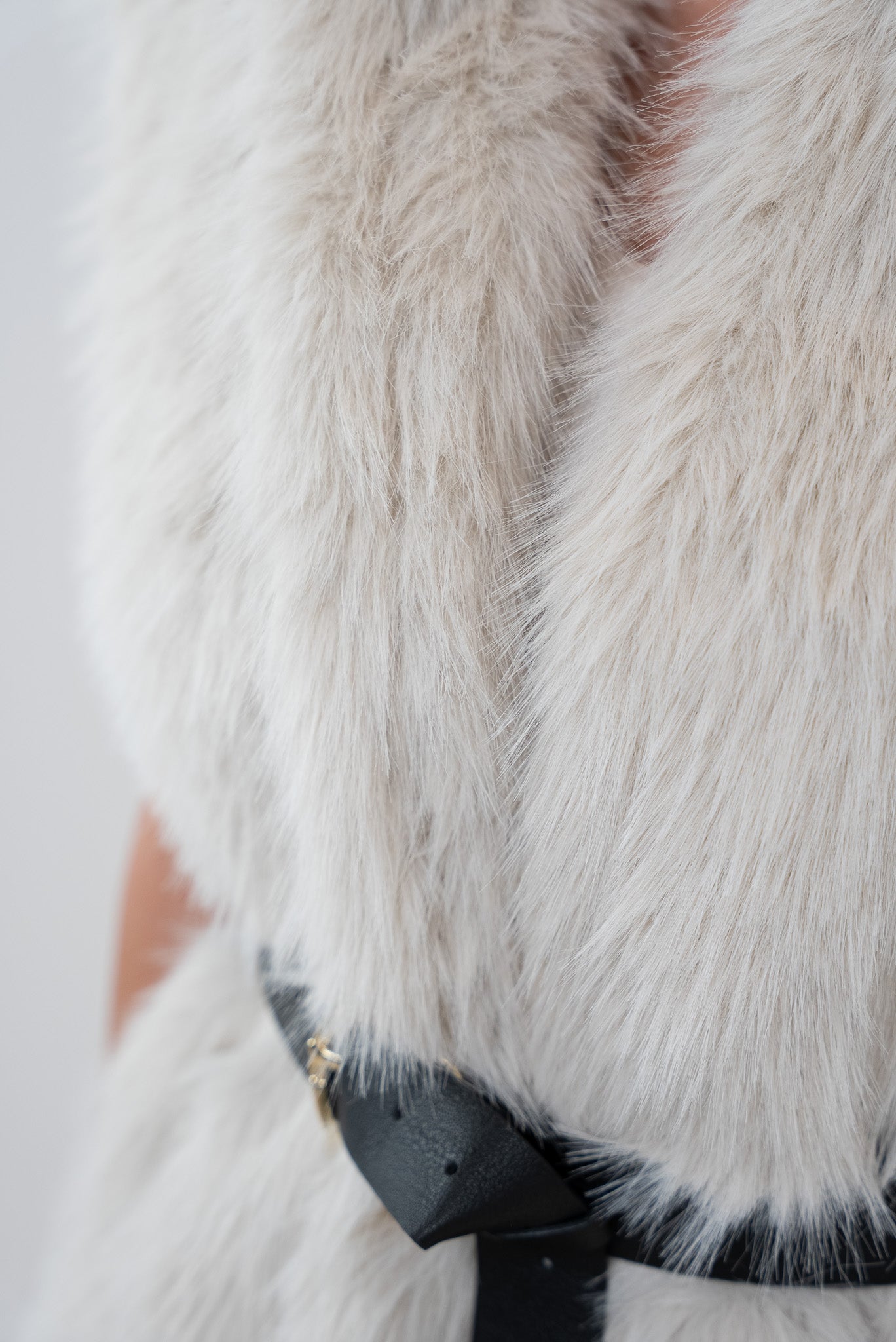 Fur vest with belt