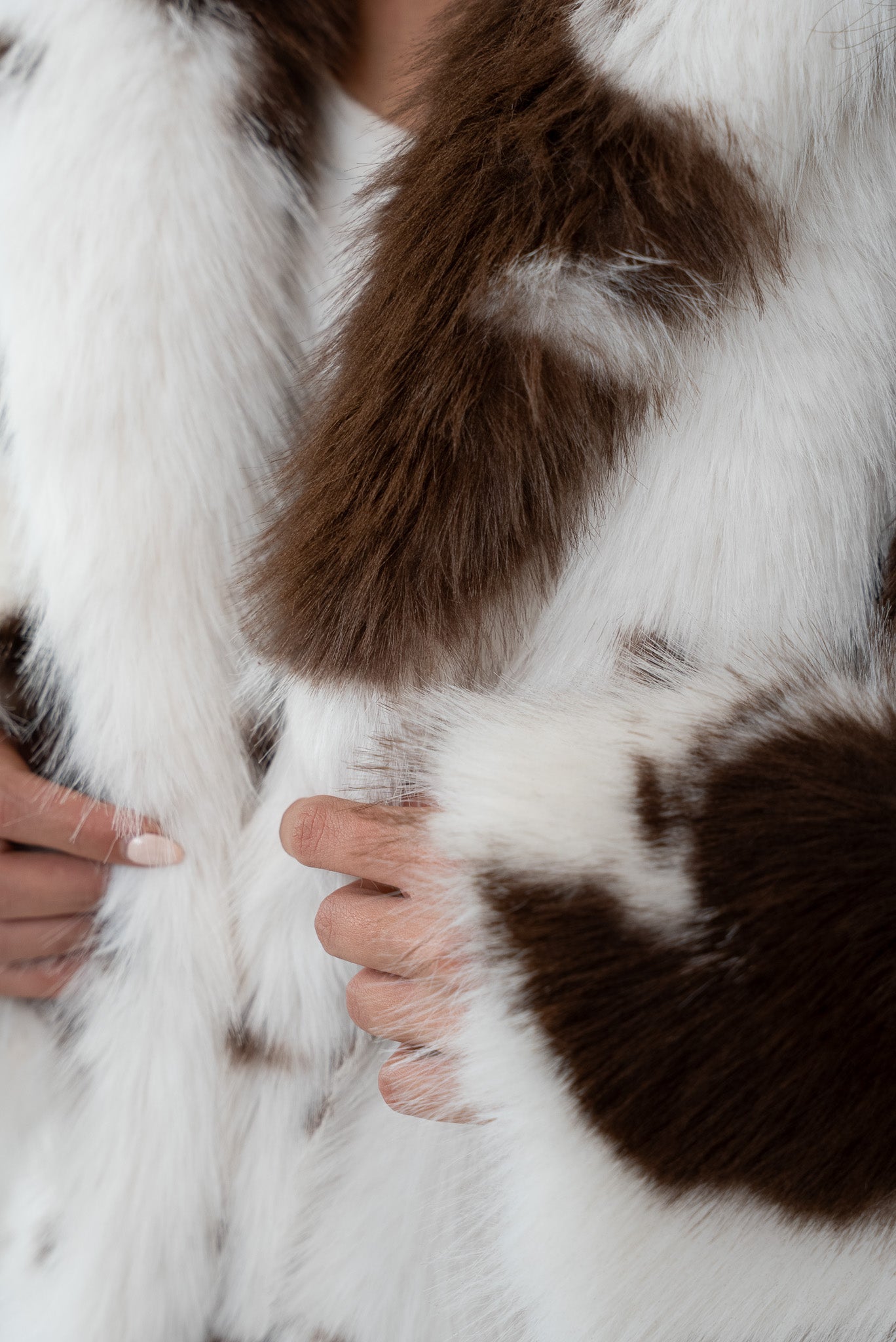 Off-white fur jacket with brown spots