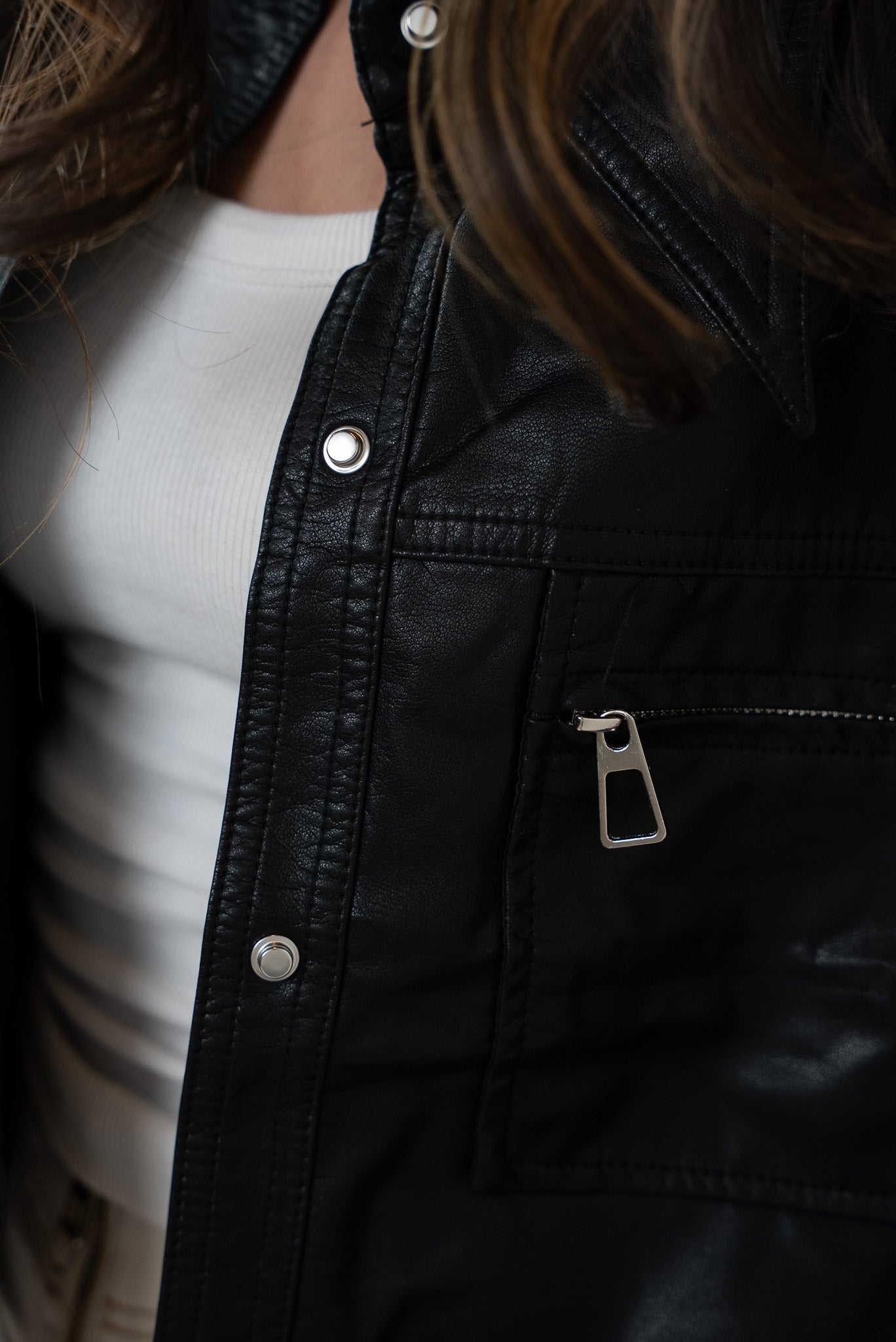 Leather jacket with button closure
