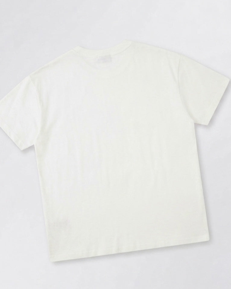 White oversized T-shirt featuring an "adorable" dog.