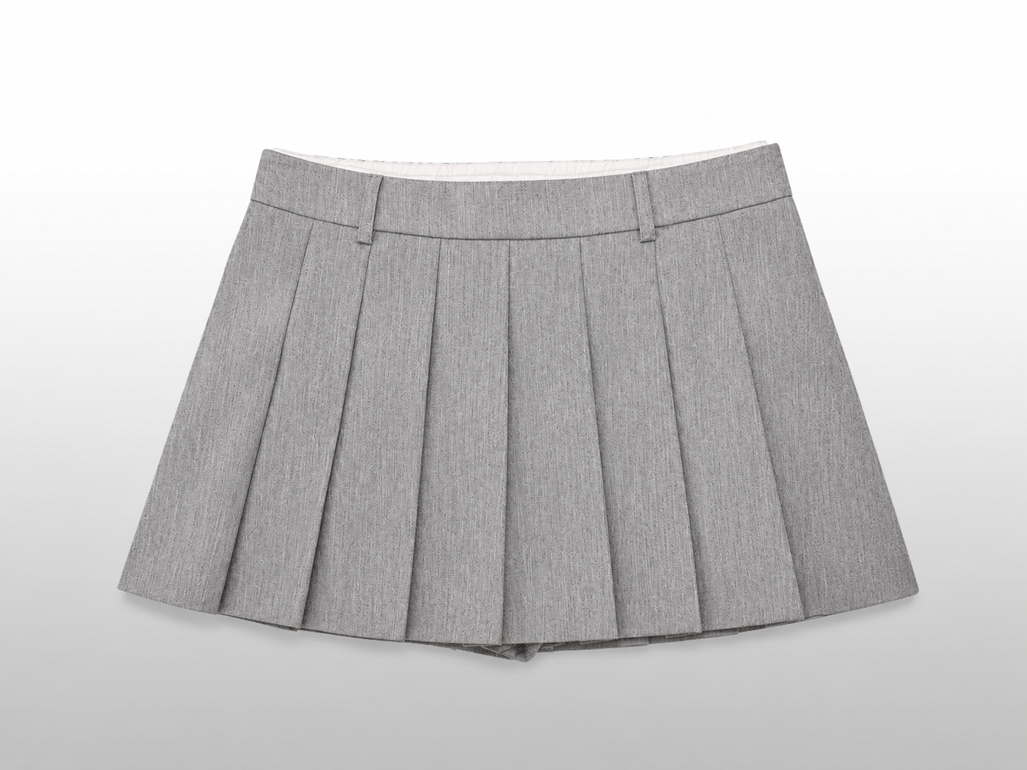 Short grey pleated skirt with a white elastic waistband.