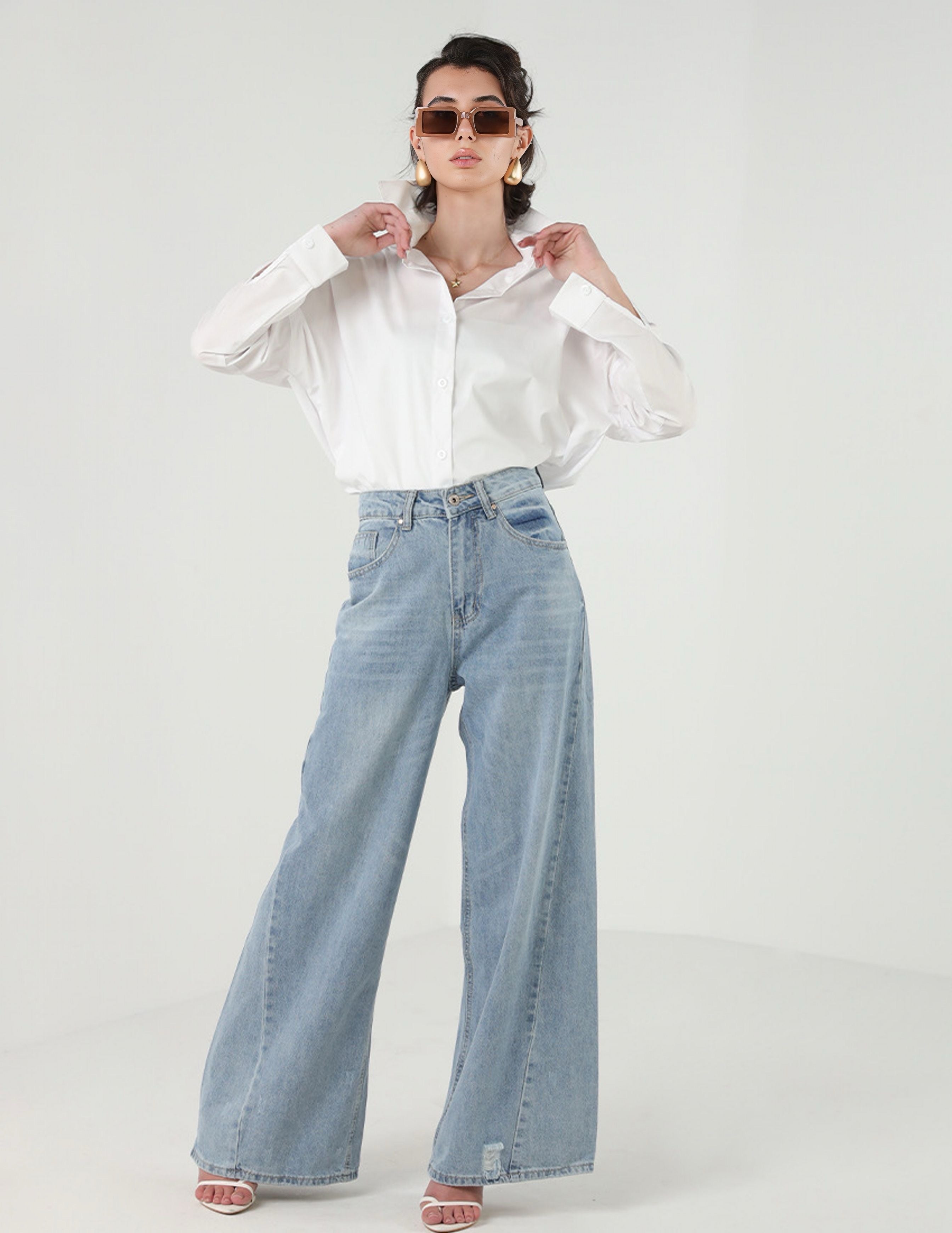 بنطال جينز أزرق واسع الساقين