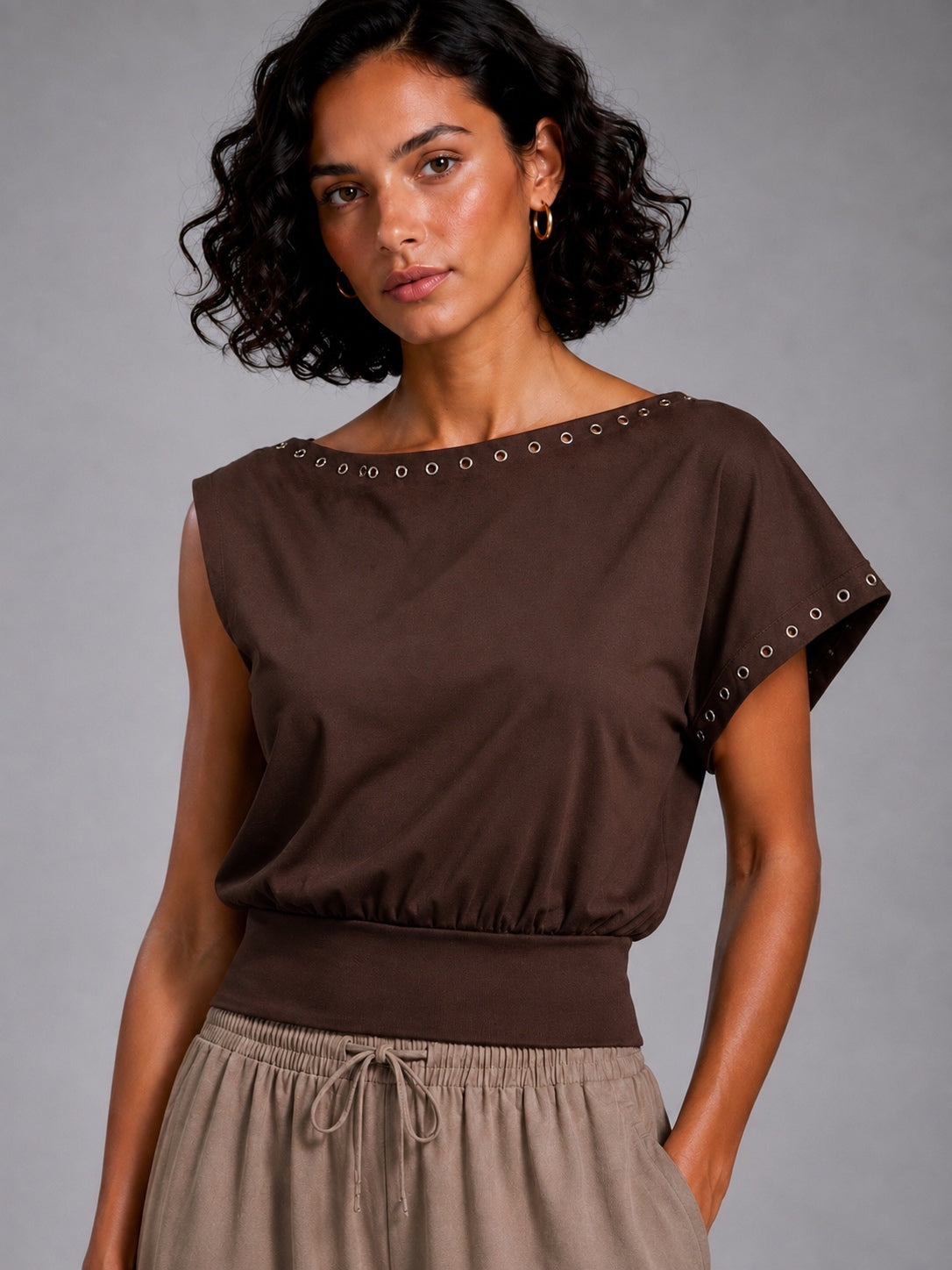Cowl-neck blouse with metal rings