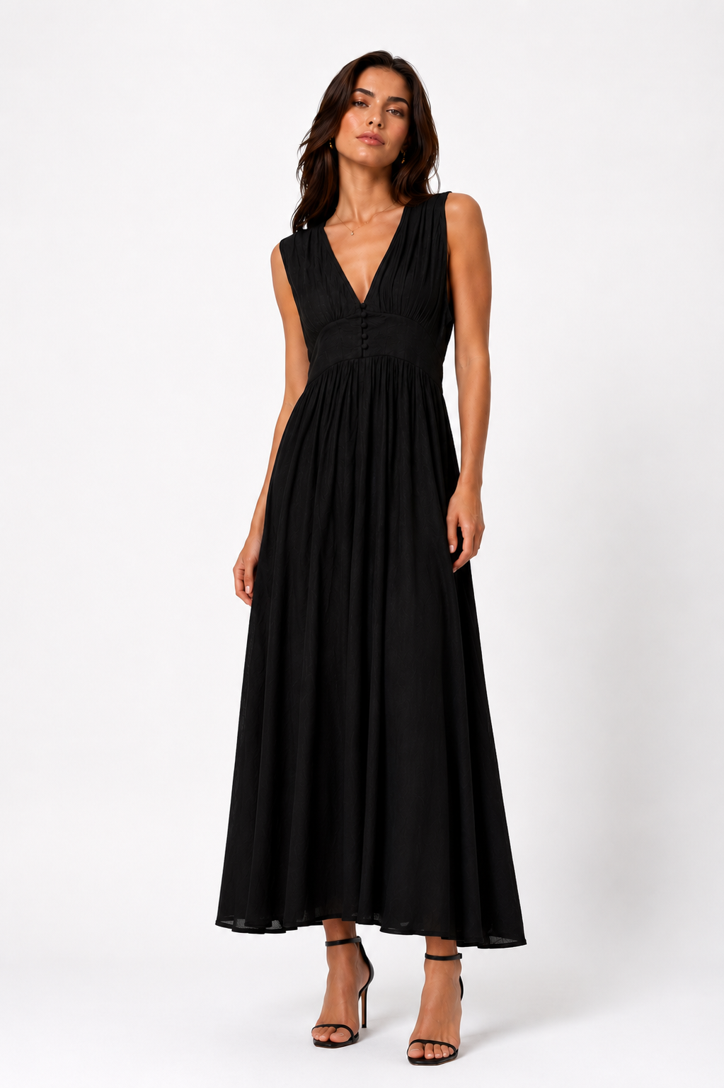Long sleeveless dress with a button-front bodice.