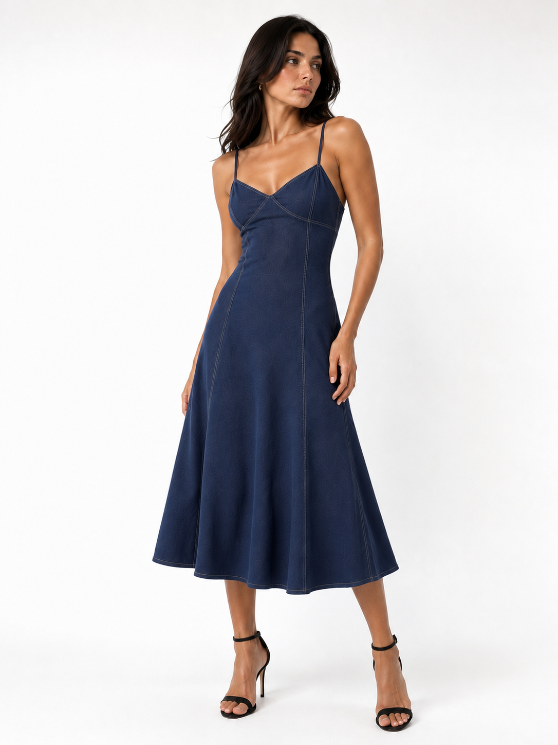 Teal sleeveless midi dress with a V-neck and honey-colored stitching.