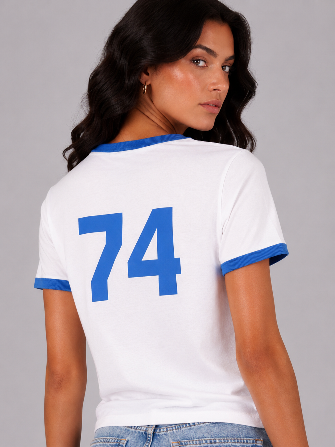 T-shirt with text and the number 74 on the front and back.