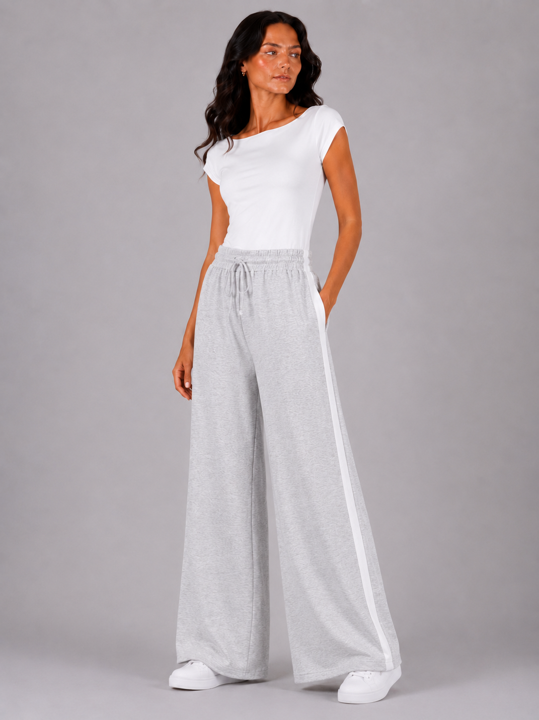 Street-style sweatpants with a white stripe down the sides.