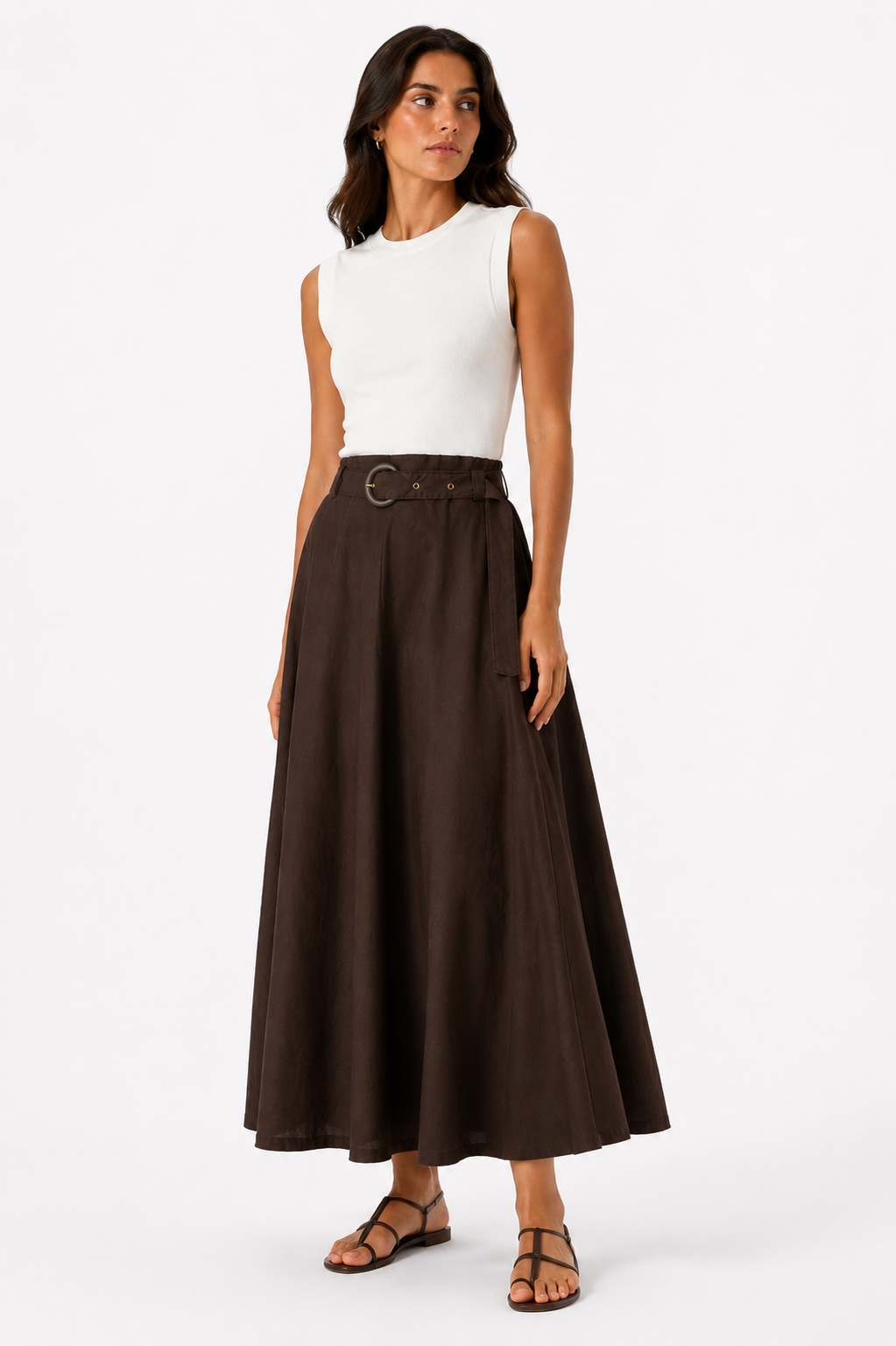 Sleeveless long dress in off-white and brown, featuring a belt.
