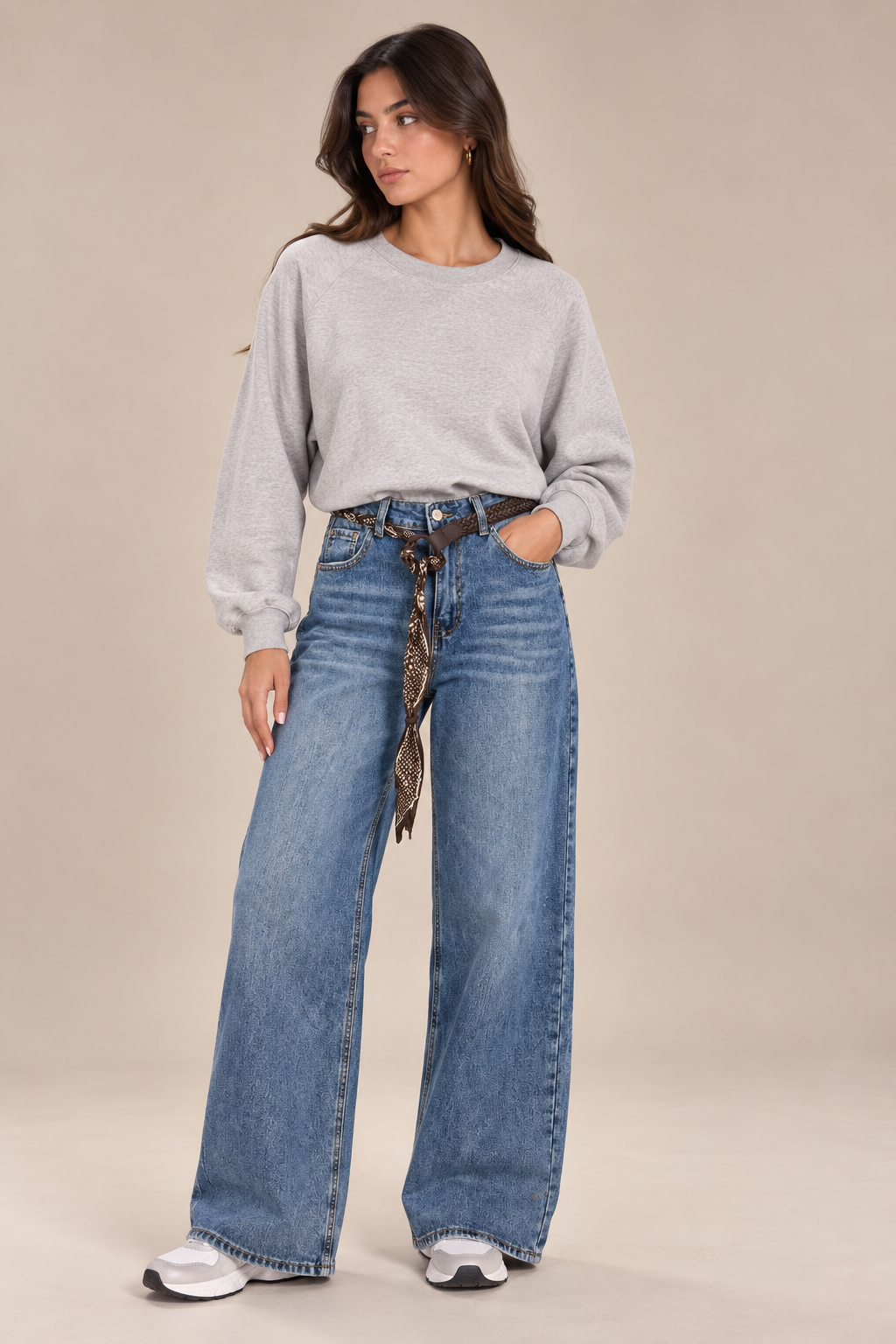 Straight-leg jeans with a brown belt and scarf