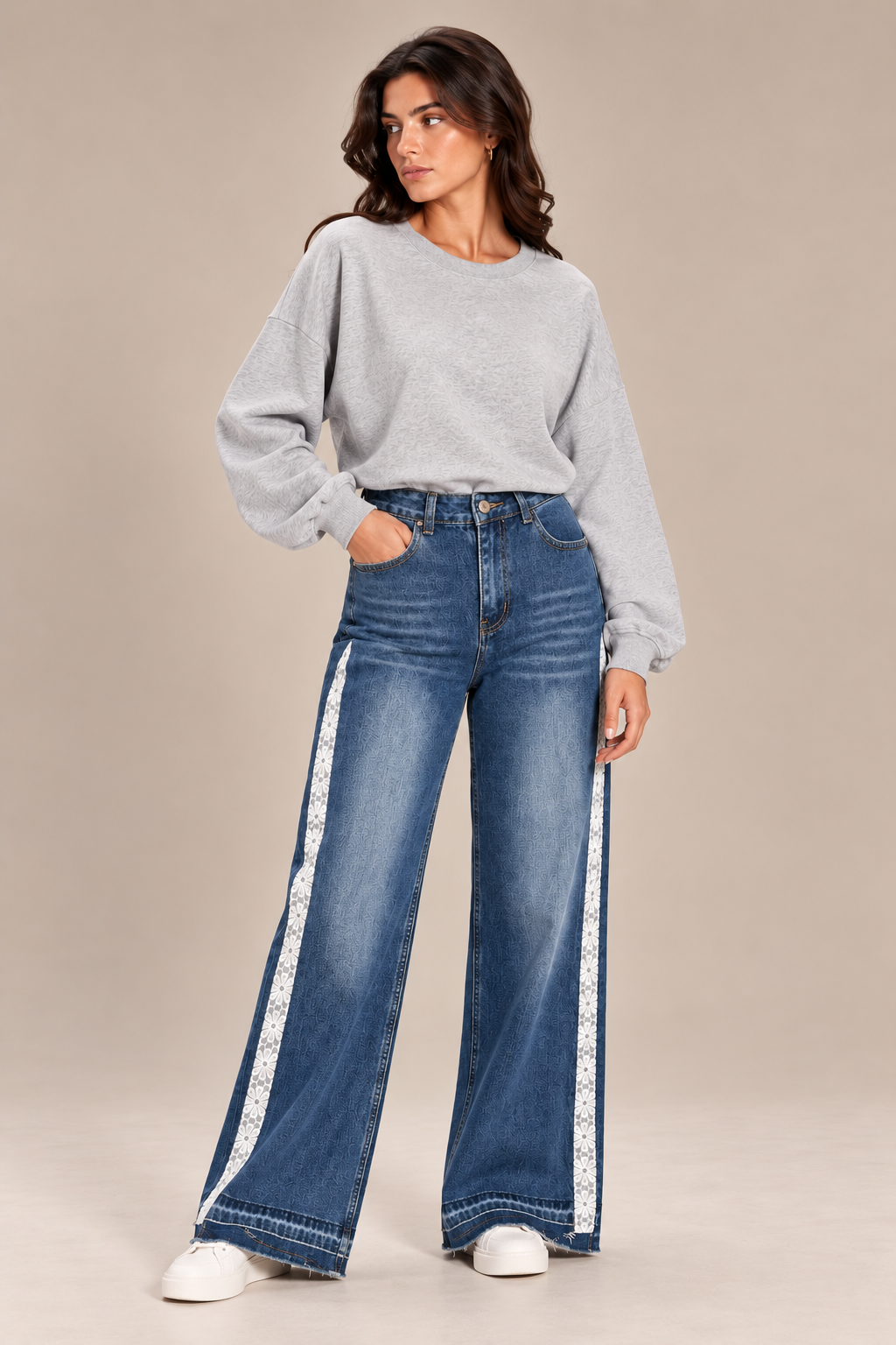 Dark blue wide-leg jeans with white lace trim on the sides