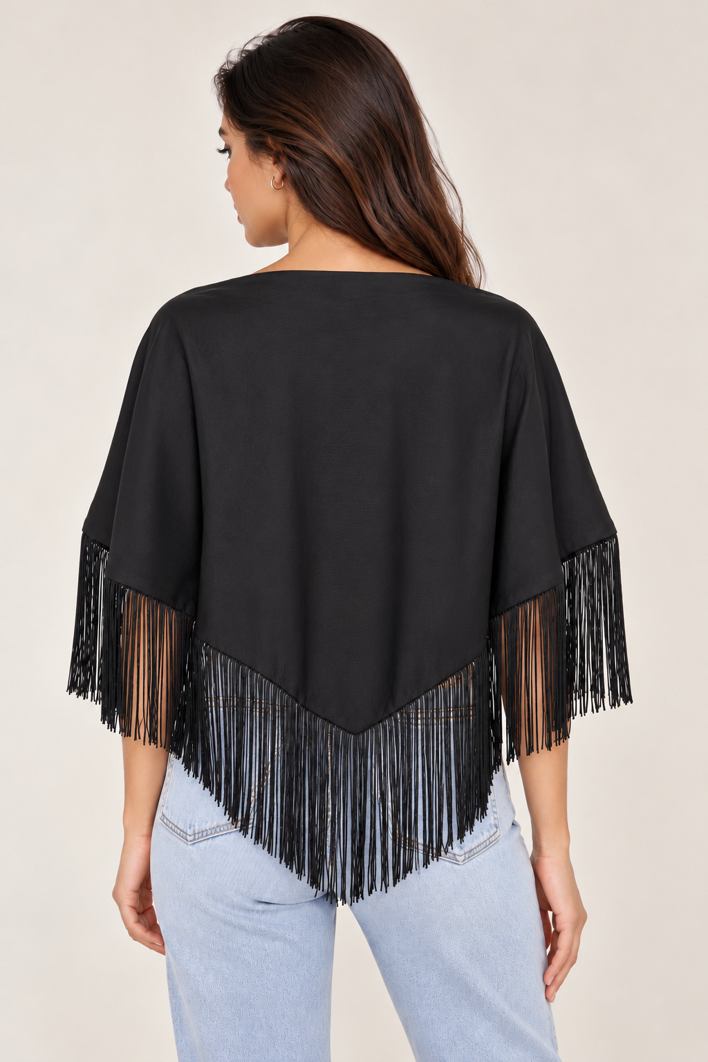 A satin shawl decorated with tassels on the shoulder and waist.