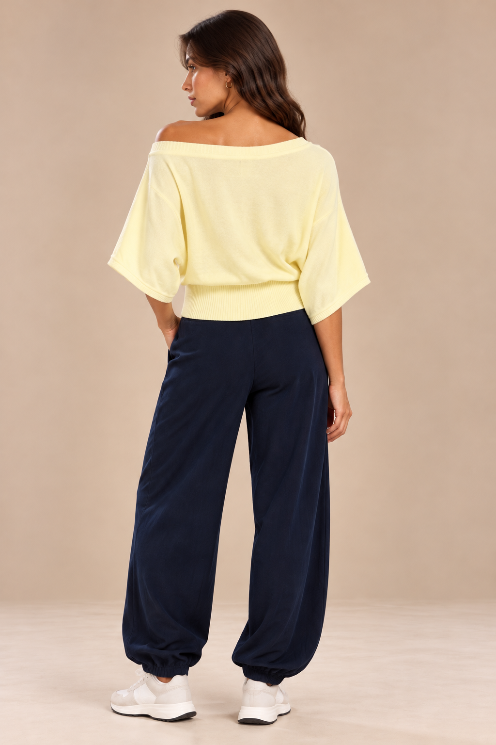 Off-the-shoulder wool blouse with wide cape sleeves