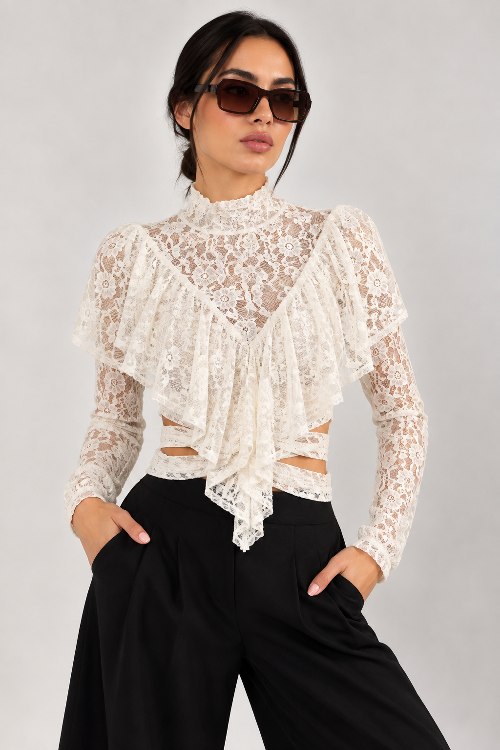Lace-sleeve top with ruffled bodice and open, tie-front waist