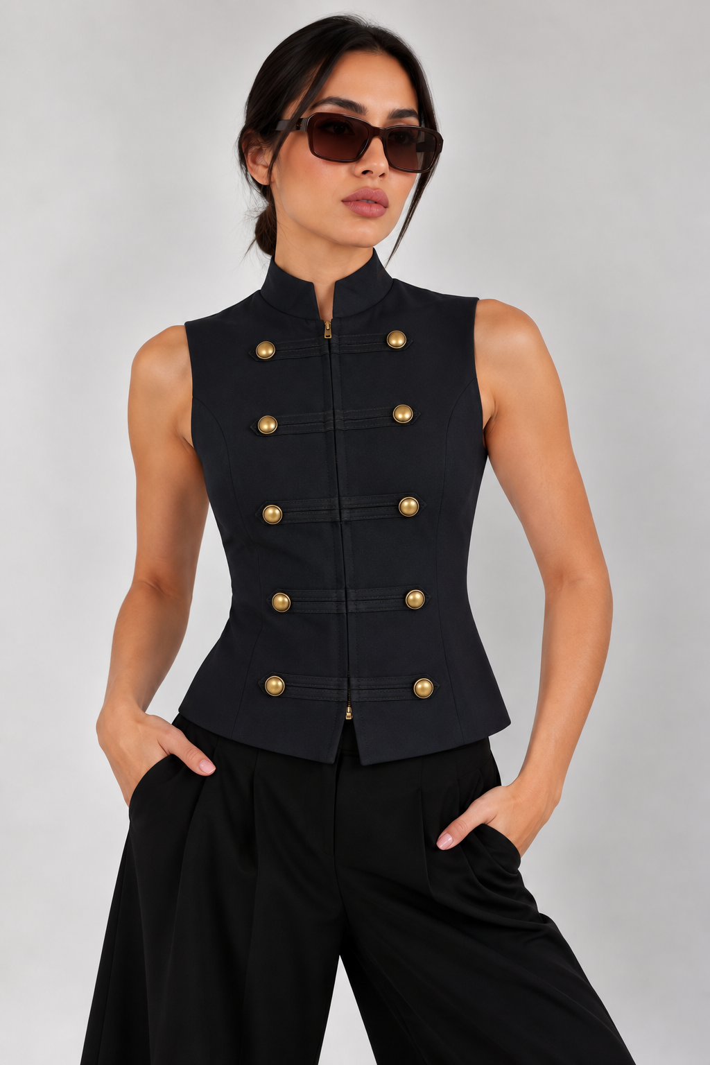 Military-style vest with bronze-colored buttons