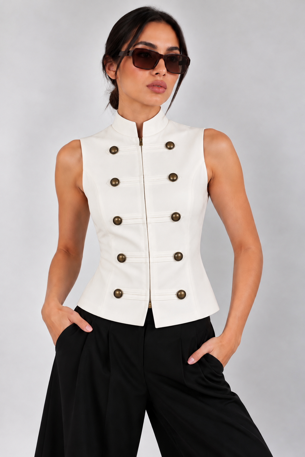 Military-style vest with bronze-colored buttons