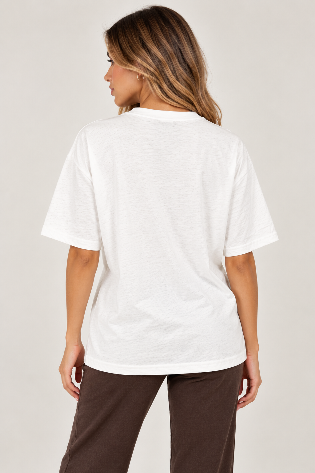 Oversized white t-shirt with "Self respect." in brown