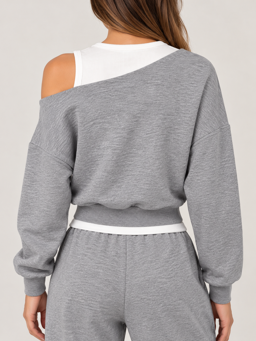 A gray blouse with a white off-the-shoulder top featuring the words "BROOKLYN83" in navy blue on the chest.