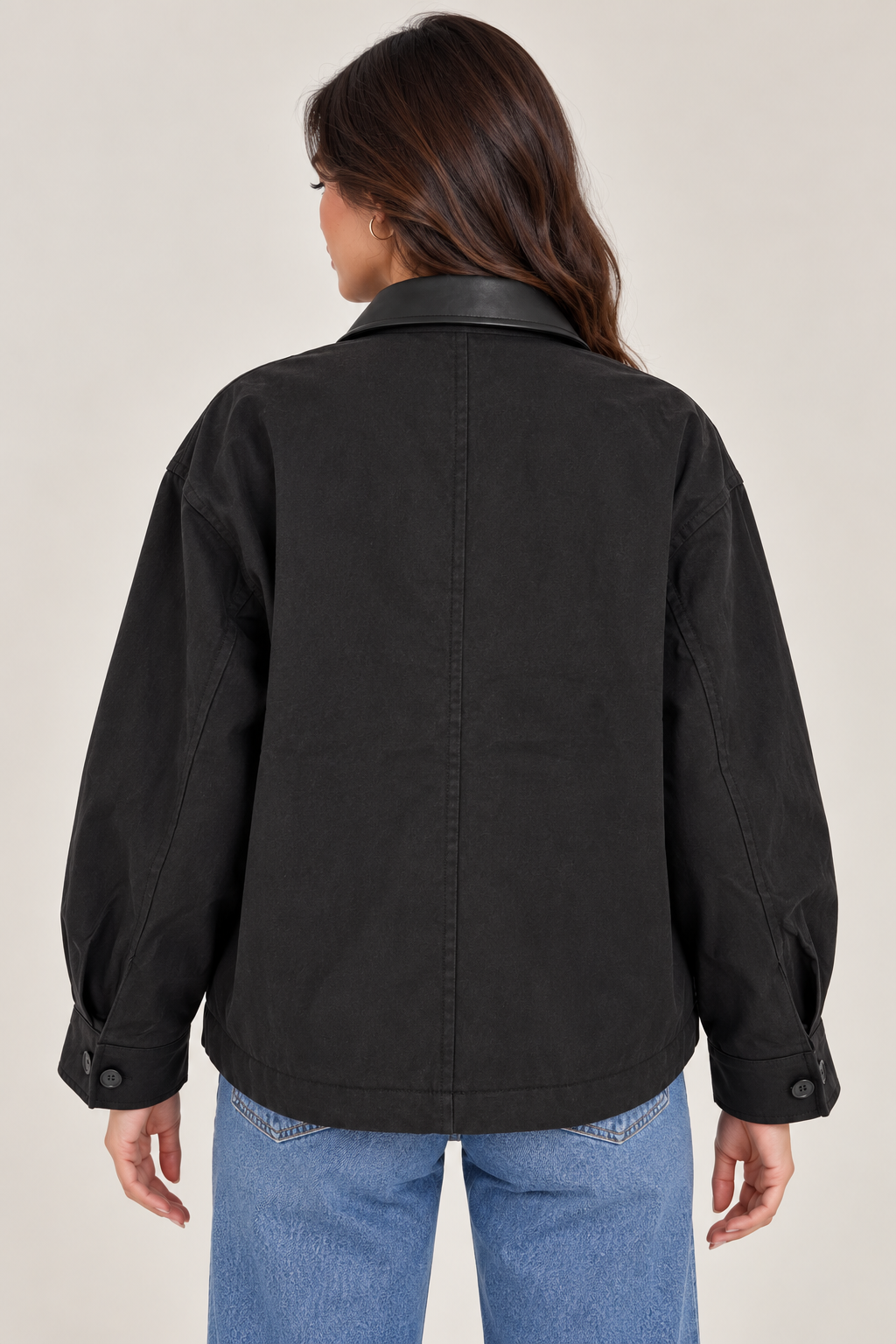 Milton jacket with zipper, leather collar, large pocket, and buttons.