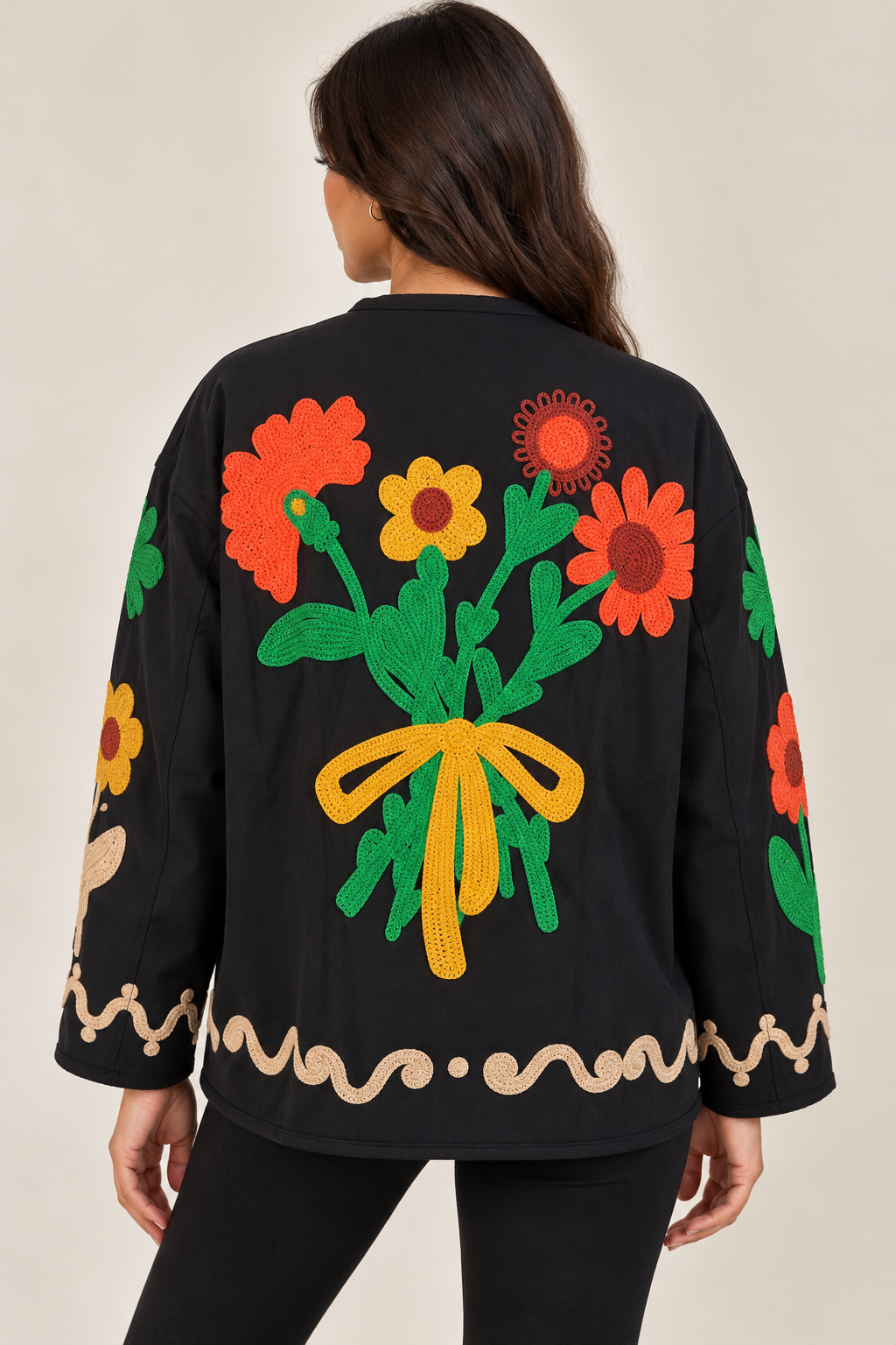 Black jacket with roses and buttons on the chest