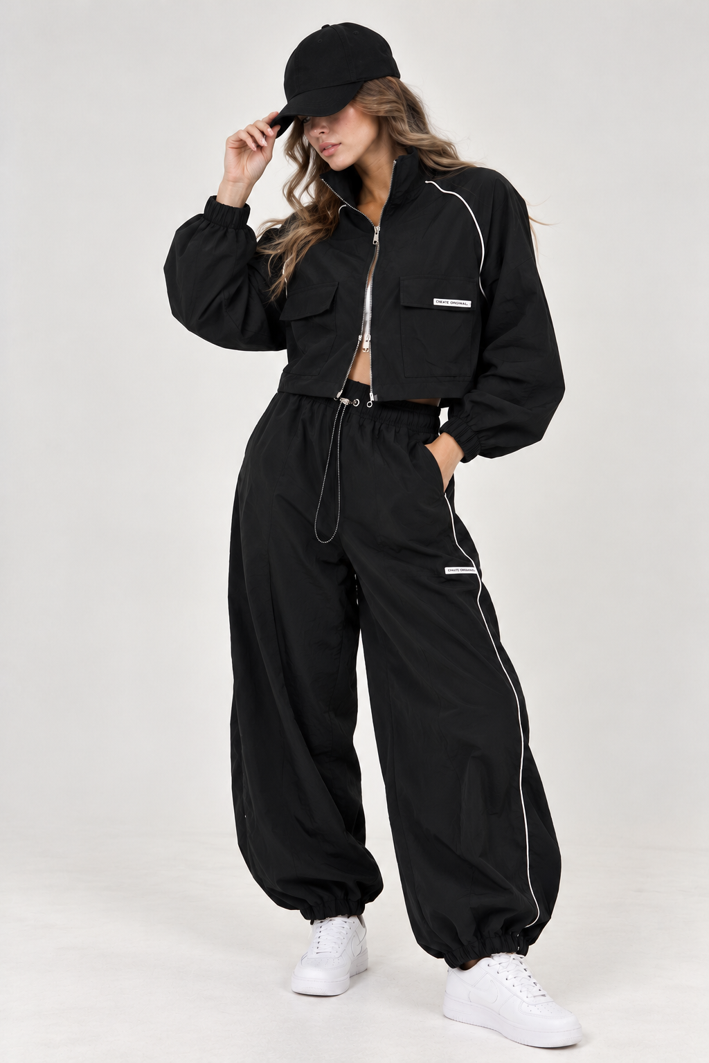 Black waterproof sweatshirt with white stripe and front pocket