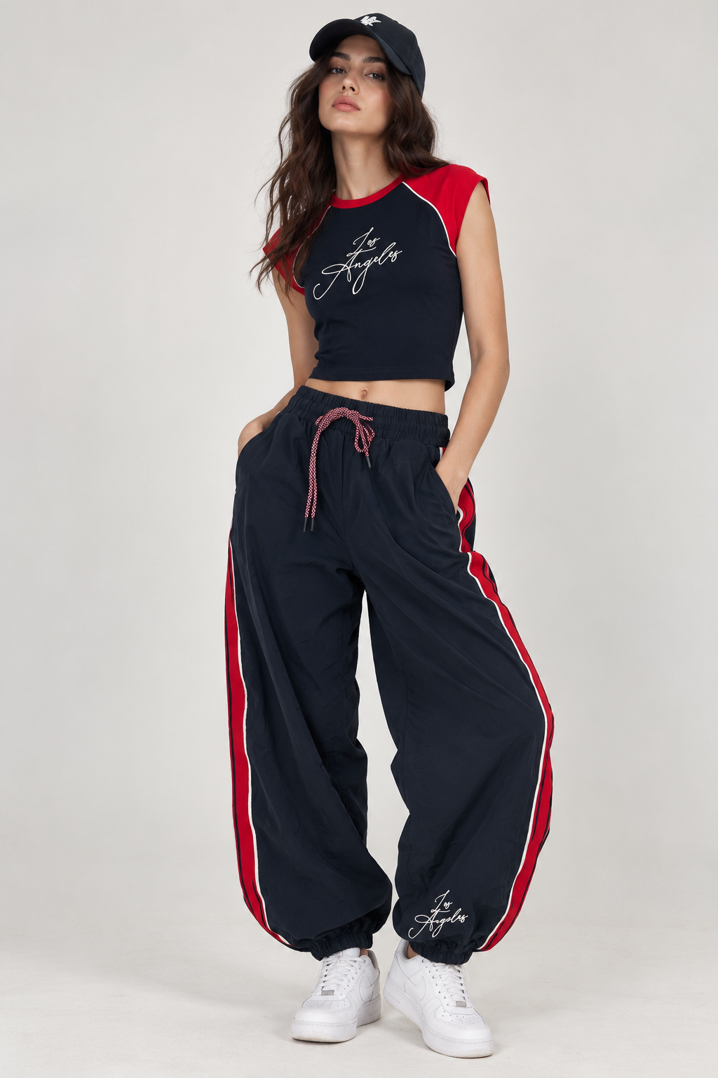 Navy blue t-shirt with red shoulders and the word "LOS ANGELES" on the chest.