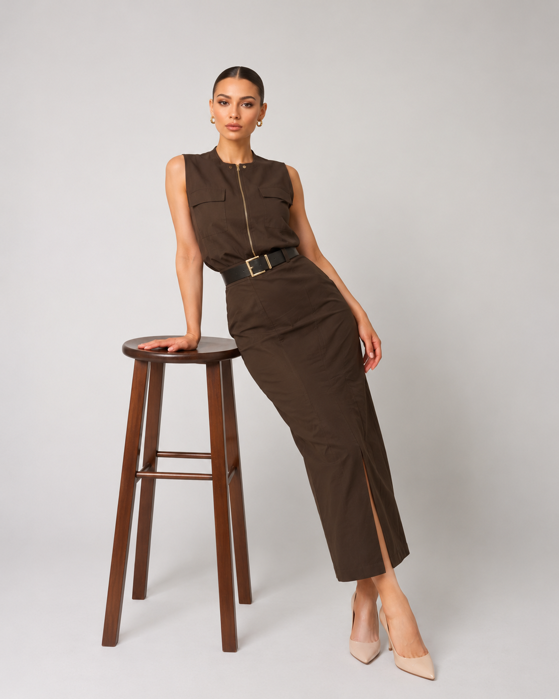 Brown vest with a chest pocket and a hidden zipper.