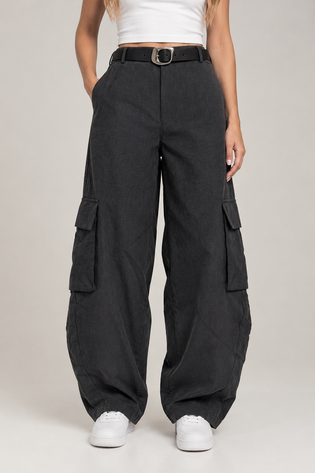 Charcoal cargo pants with a silver buckle belt