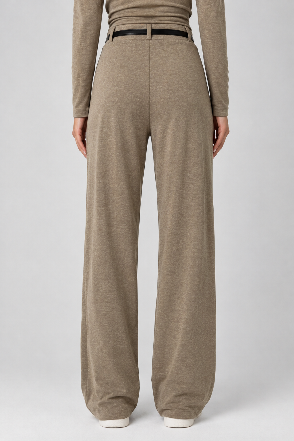 Beige cotton straight-cut trousers with a black belt
