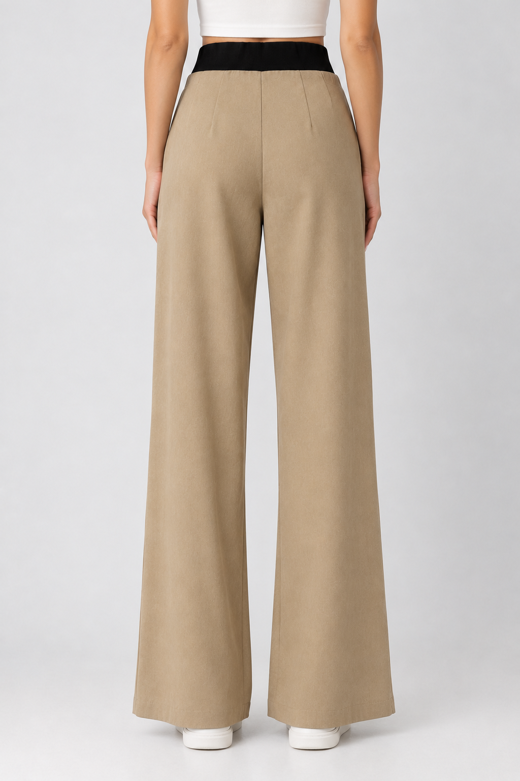 Wide leg beige trousers with a brown elasticated pleated waistband