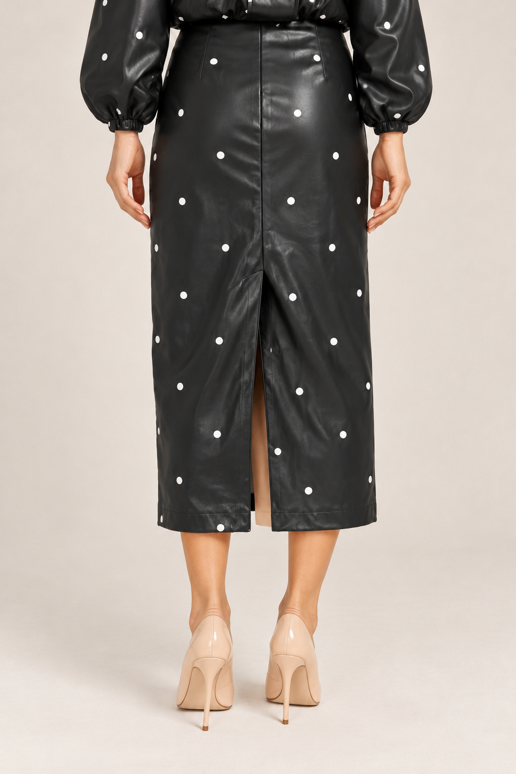 Black ribbed midi skirt with polka dot leather