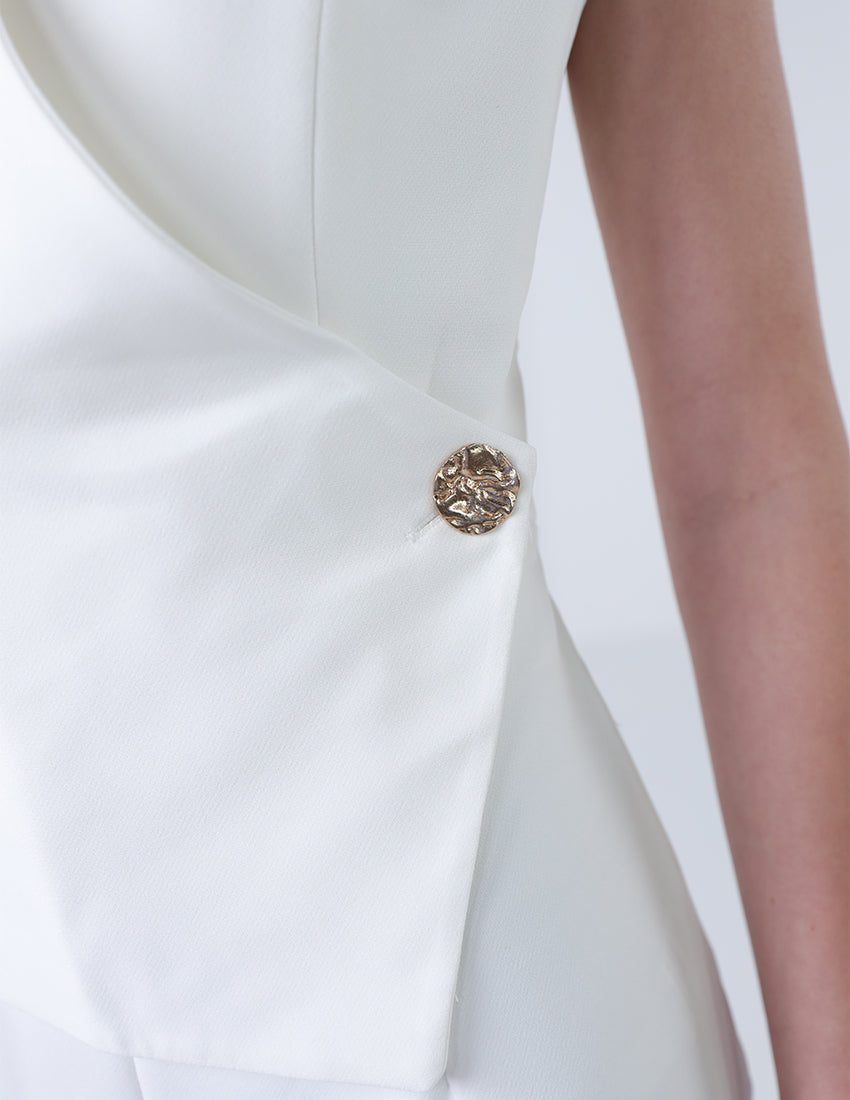 جمبسوت بدون أكمام بقصّة مستقيمة