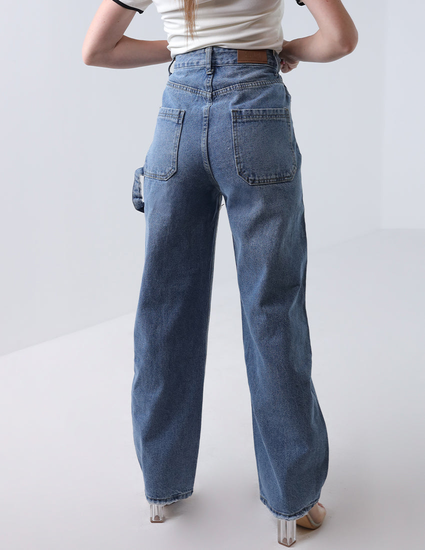 High-waisted baggy blue jeans with side embellishments