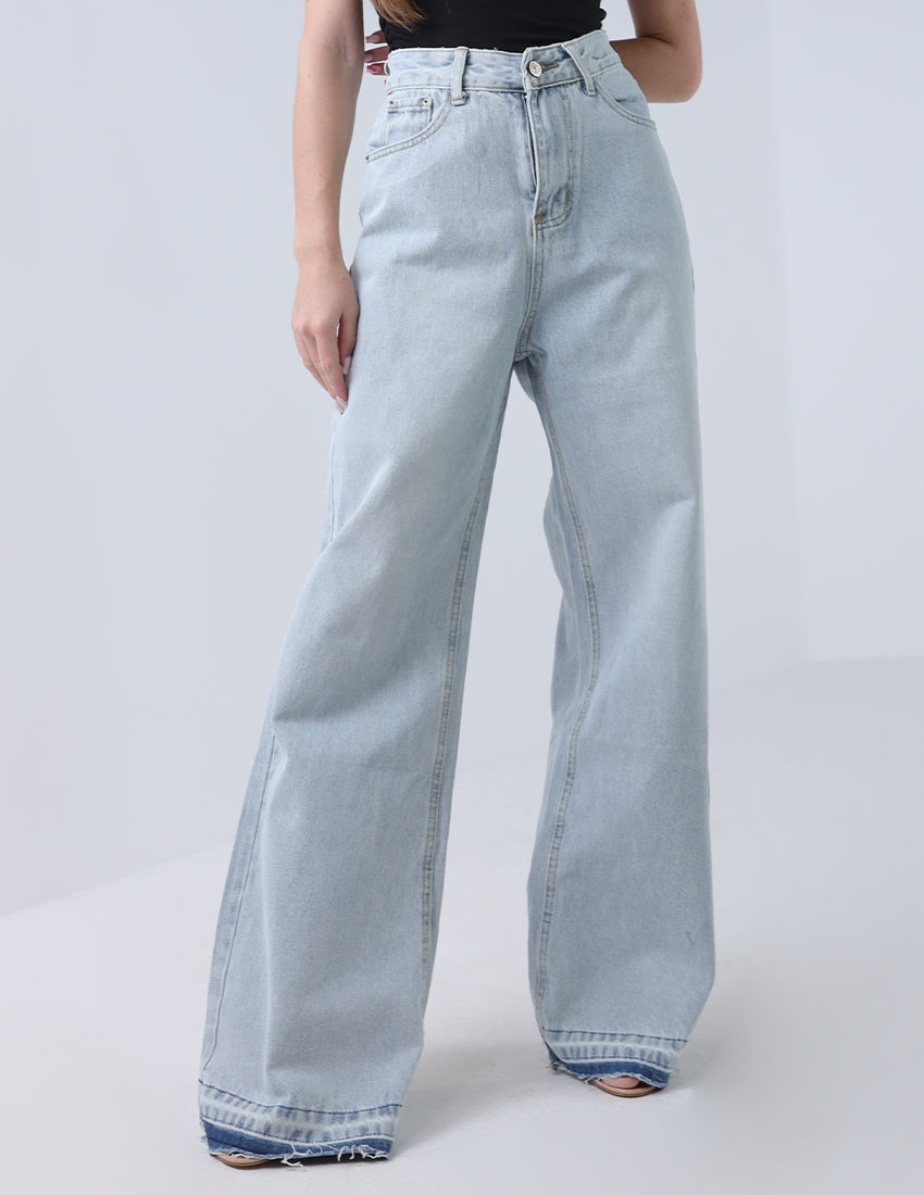 High-waisted wide leg jeans, blue with a dark blue hem.