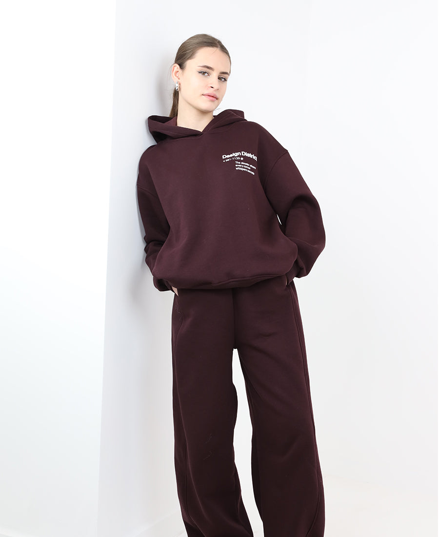 Maroon hoodie with printed words