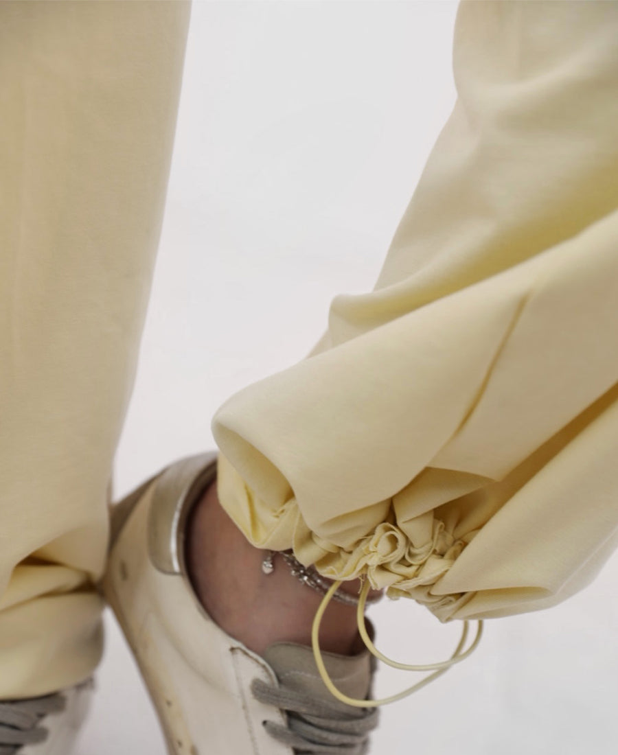 Training jacket with a hood and wide-leg trousers with an elastic waist