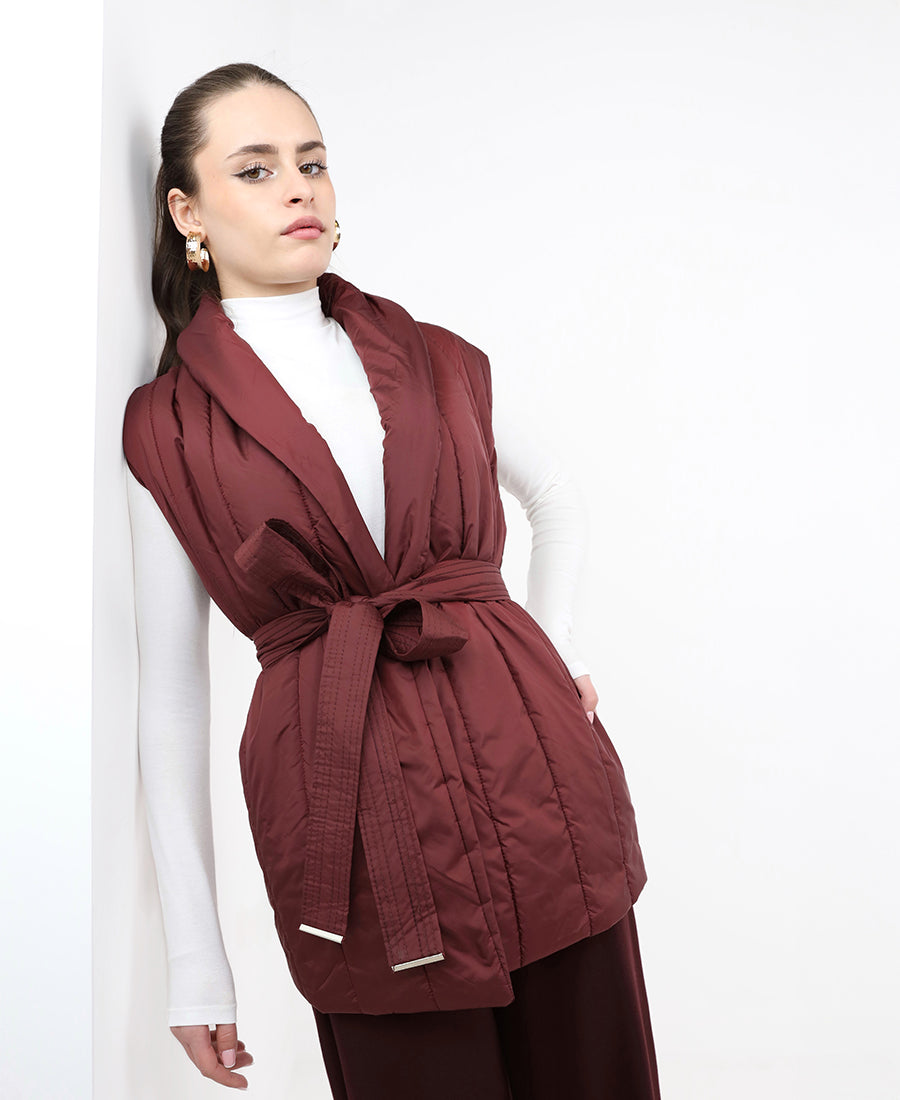 Vest on the back is wool with belt