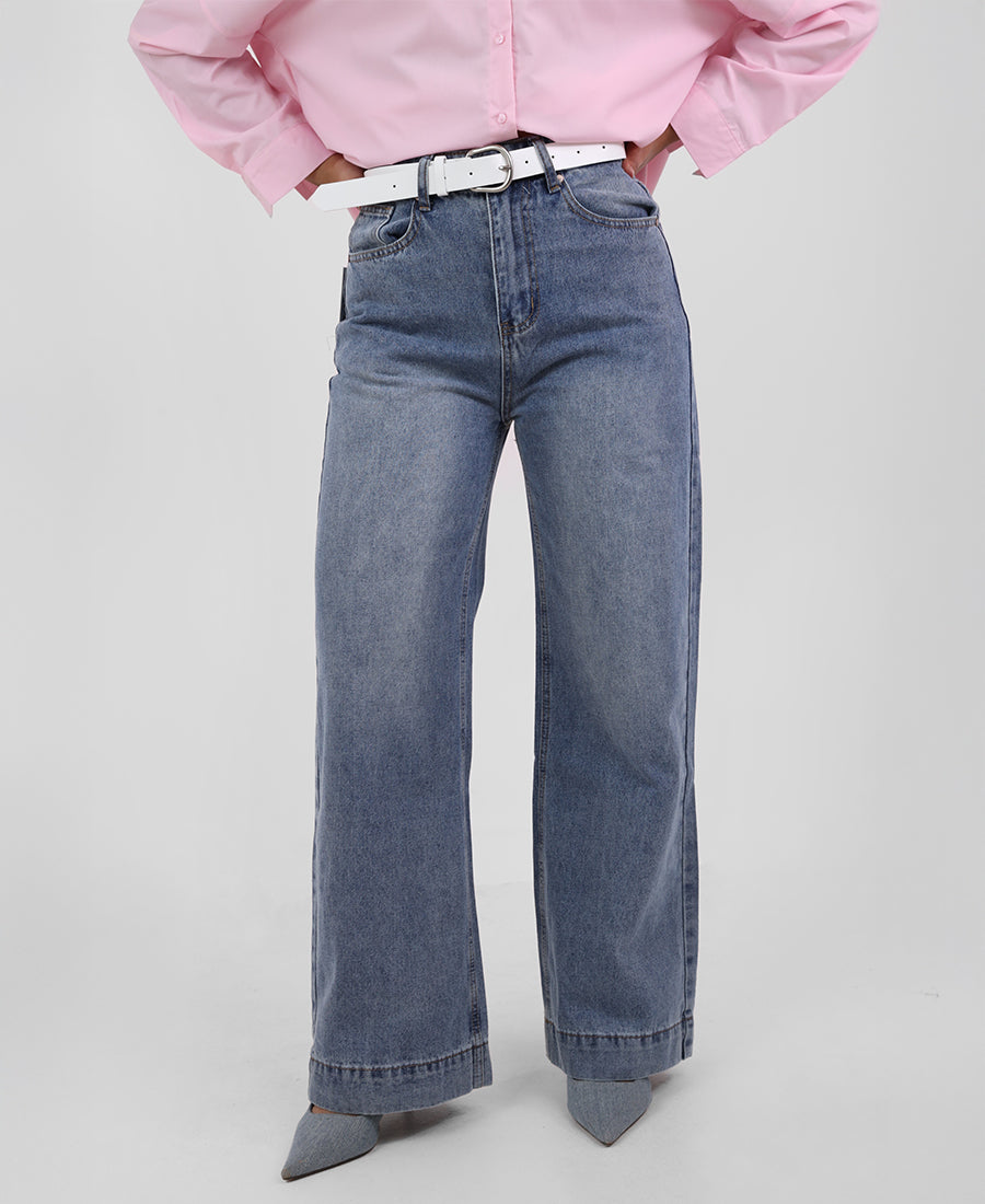 Straight-leg jeans with a white belt