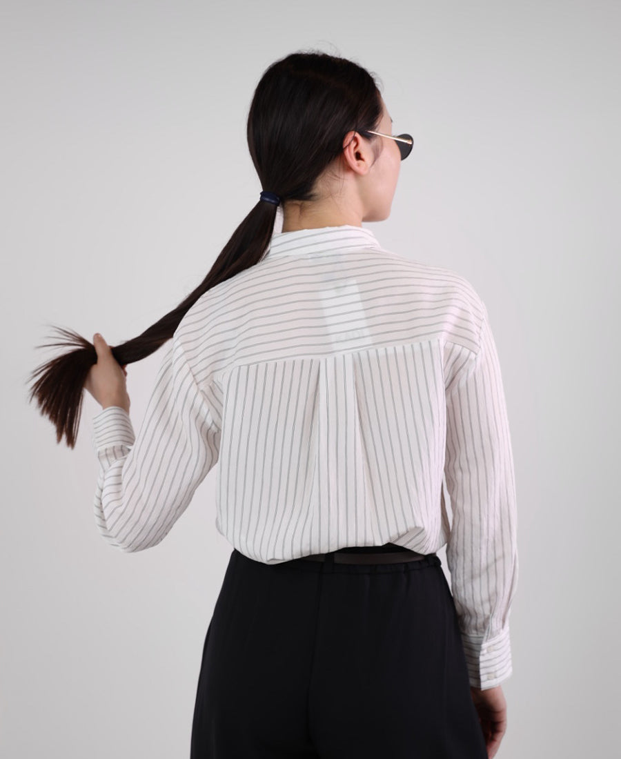 Oversized white shirt with black stripes