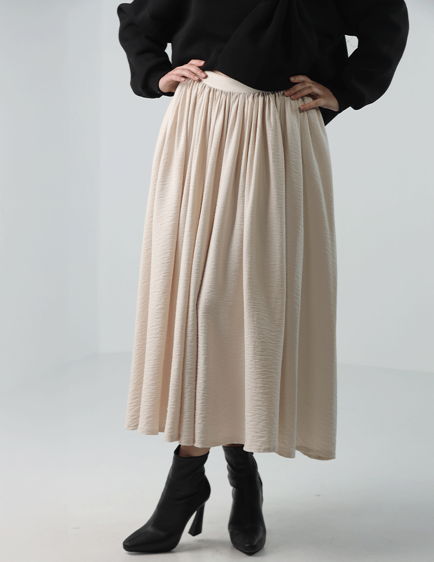 Long pleated flowy skirt