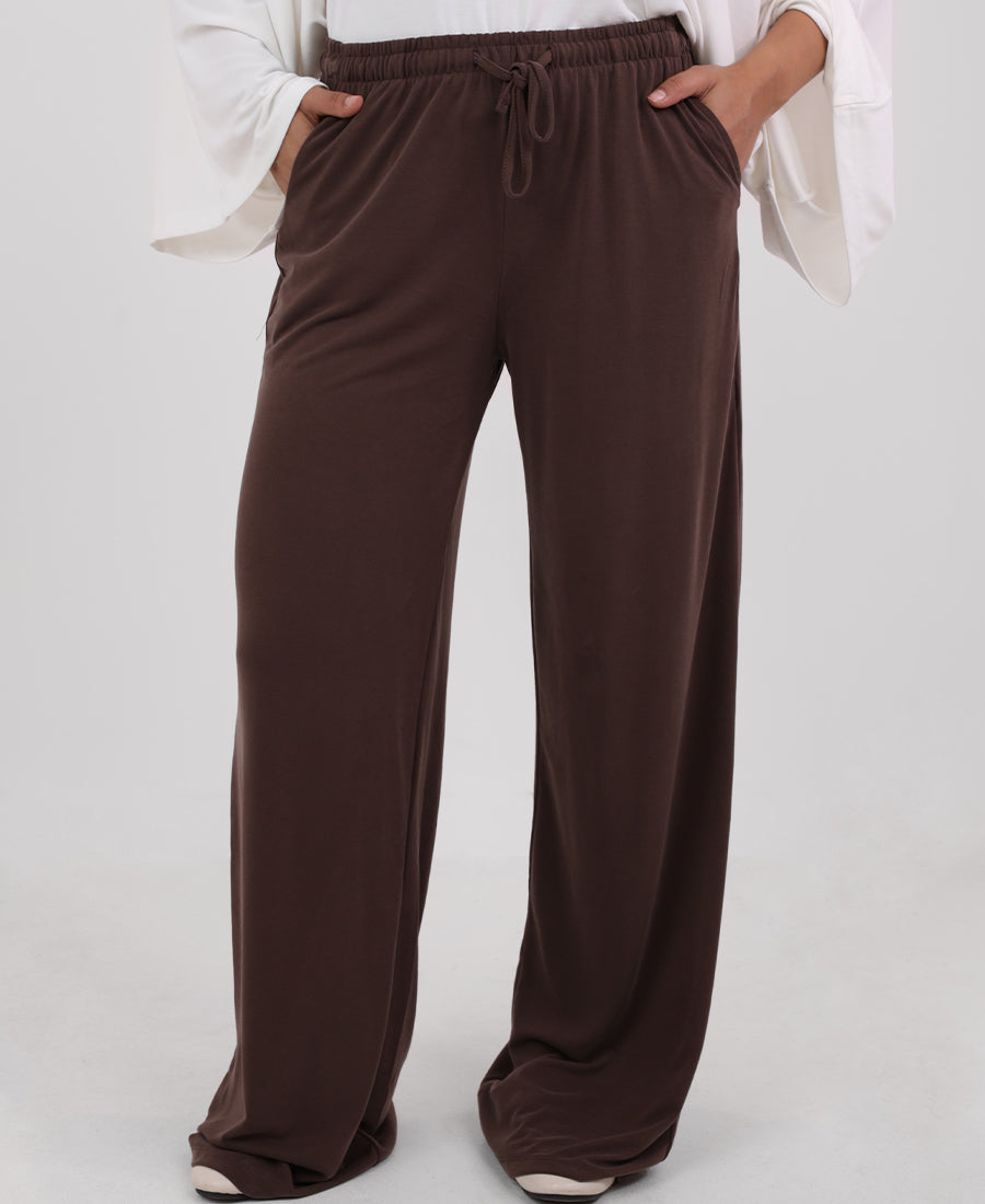 Butter brown straight-leg trousers with an elastic waistband