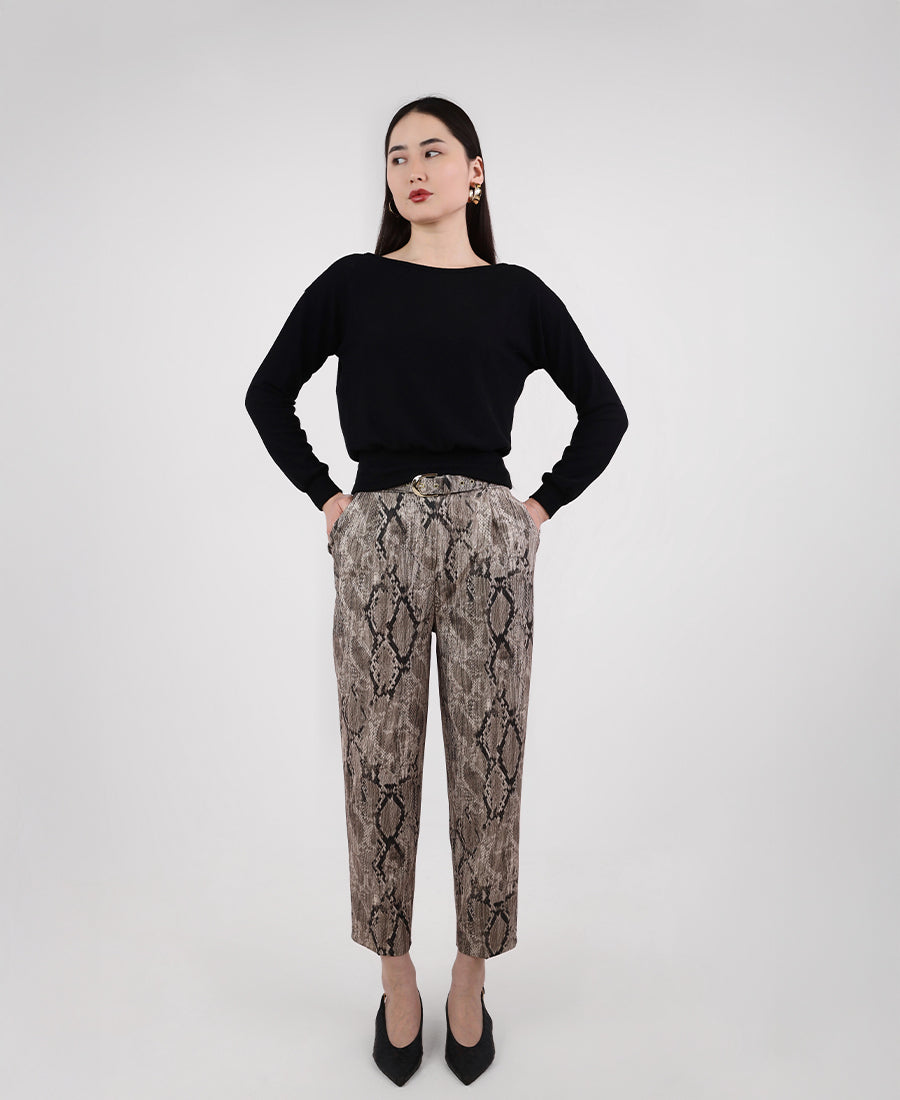 High-waisted snakeskin pants with a belt
