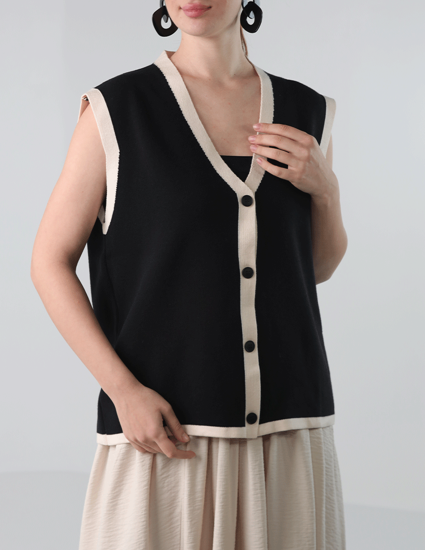Oversized black wool vest with beige sides